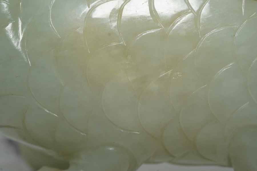 A large Chinese pale celadon jade ‘dragon-fish’ vessel and cover, 19th century